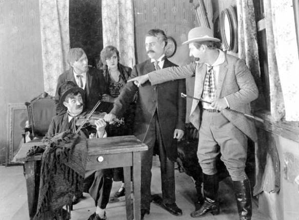 Motion picture scene from "Strangled Harmony"