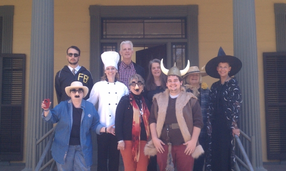 Florida Division of Cultural Affairs staff members in front of the Brokaw-McDougall House on Halloween.