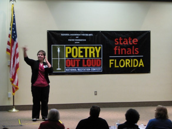 In the third round, Savannah McCord from the Florida School for the Deaf and Blind presented William Blake's "A Poison Tree" in ASL.